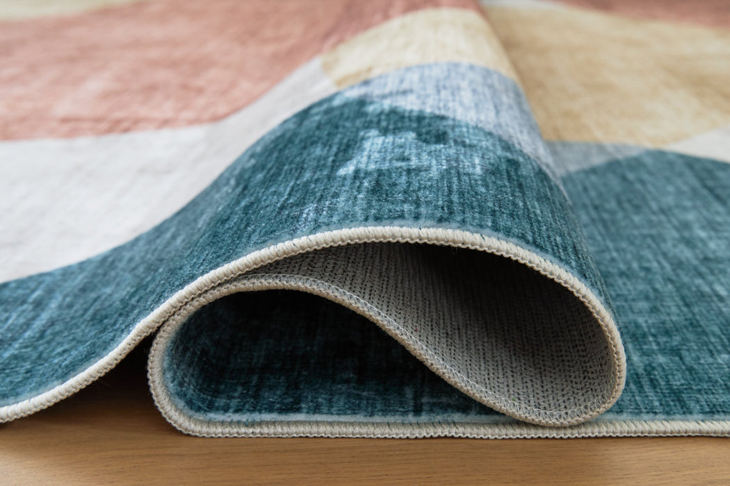 Chanleigh Washable 5' x 7' Area Rug - Dow Furniture (ME)